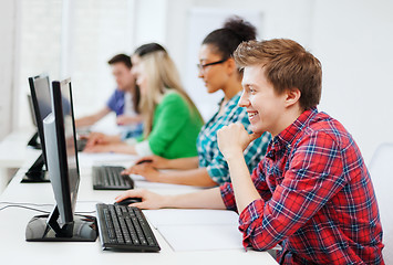 Image showing student with computer studying at school