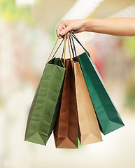 Image showing woman hands holding shopping bags