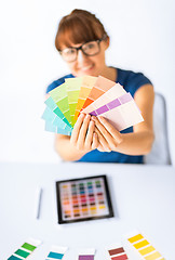 Image showing woman showing pantone color samples