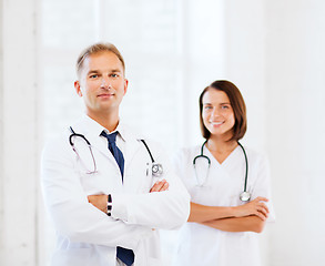 Image showing two doctors with stethoscopes