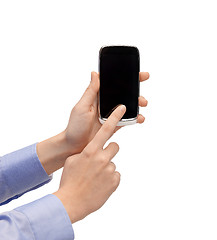 Image showing woman hand with smartphone