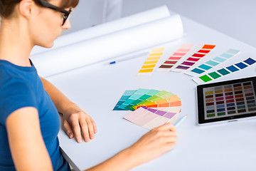 Image showing woman working with color samples for selection