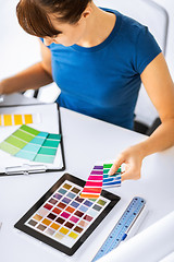 Image showing woman working with color samples for selection