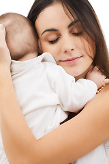 Image showing happy mother with adorable baby