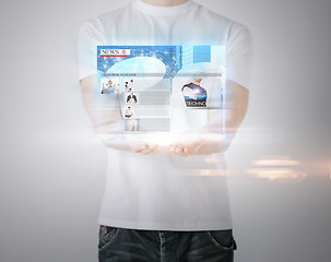 Image showing man with virtual screen and news