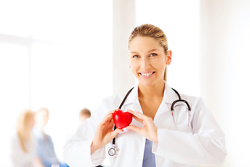 Image showing female doctor with heart