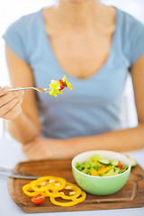 Image showing woman hand holding fork with vegetables