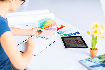 Image showing woman working with color samples for selection