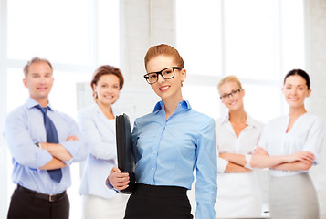 Image showing businesswoman with tablet pc in office