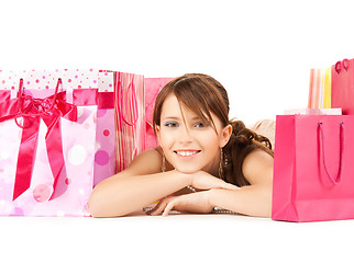 Image showing girl with color gift bags