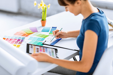 Image showing woman working with color samples for selection