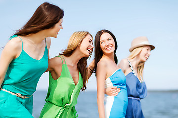 Image showing girls walking on the beach