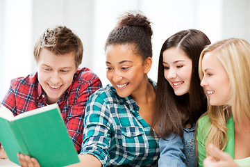 Image showing students reading book at school