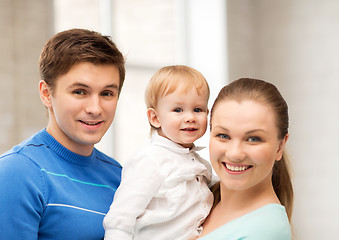 Image showing happy family with adorable baby