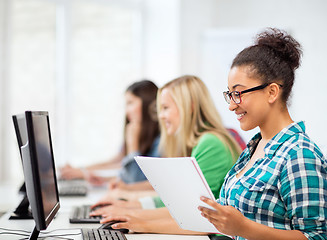 Image showing african student with computer studying at school