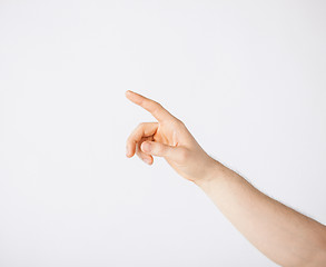 Image showing man hand pointing at something