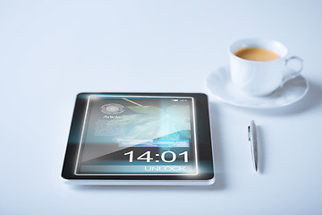 Image showing tablet pc and cup of coffee