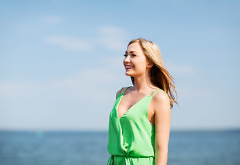 Image showing girl standing on the beach