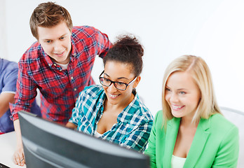 Image showing students with computer studying at school