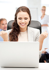 Image showing businesswoman with computer in office