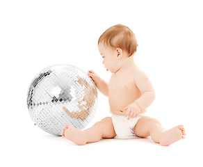 Image showing child playing with disco ball