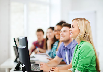 Image showing students with computers studying at school