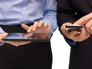 Image showing hands with smartphones and tablet pc