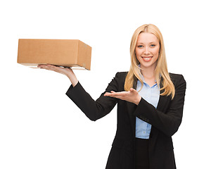 Image showing businesswoman holding cardboard box