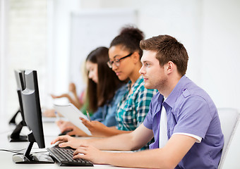 Image showing students with computers studying at school