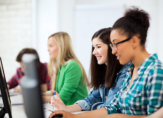 Image showing students with computers studying at school