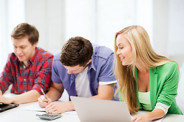 Image showing students writing test or exam in lecture at school