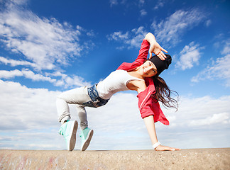 Image showing beautiful dancing girl in movement