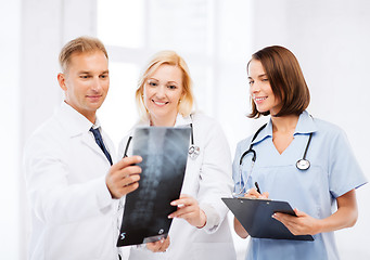 Image showing doctors looking at x-ray