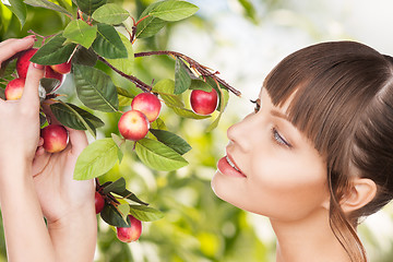 Image showing woman with apple twig