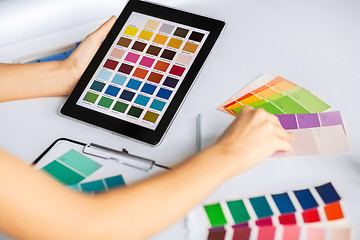 Image showing woman working with color samples for selection