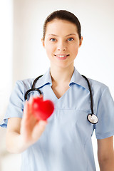 Image showing female doctor with heart