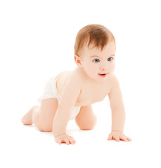 Image showing crawling curious baby