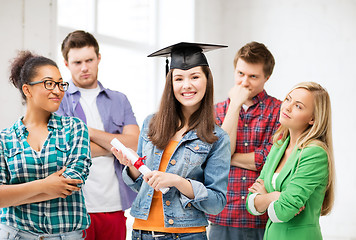 Image showing girl in graduation cap with certificate