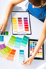 Image showing woman working with color samples for selection