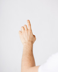 Image showing man hand pointing at something