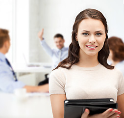 Image showing businesswoman with tablet pc in office