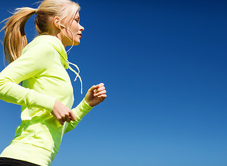 Image showing woman doing running outdoors