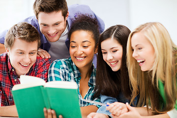 Image showing students reading book at school