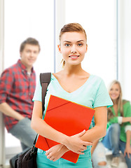 Image showing student girl with folders and school bag