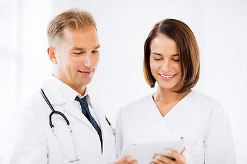 Image showing two doctors looking at tablet pc