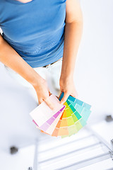 Image showing woman working with color samples for selection