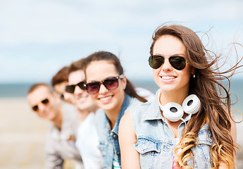 Image showing teenage girl with friends outside