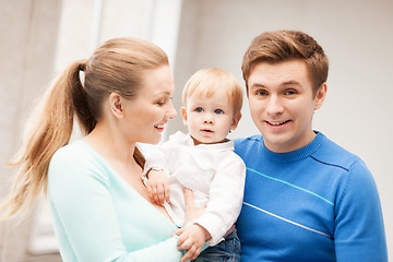 Image showing happy family with adorable baby