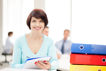 Image showing woman with folders