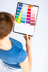 Image showing woman working with color samples for selection